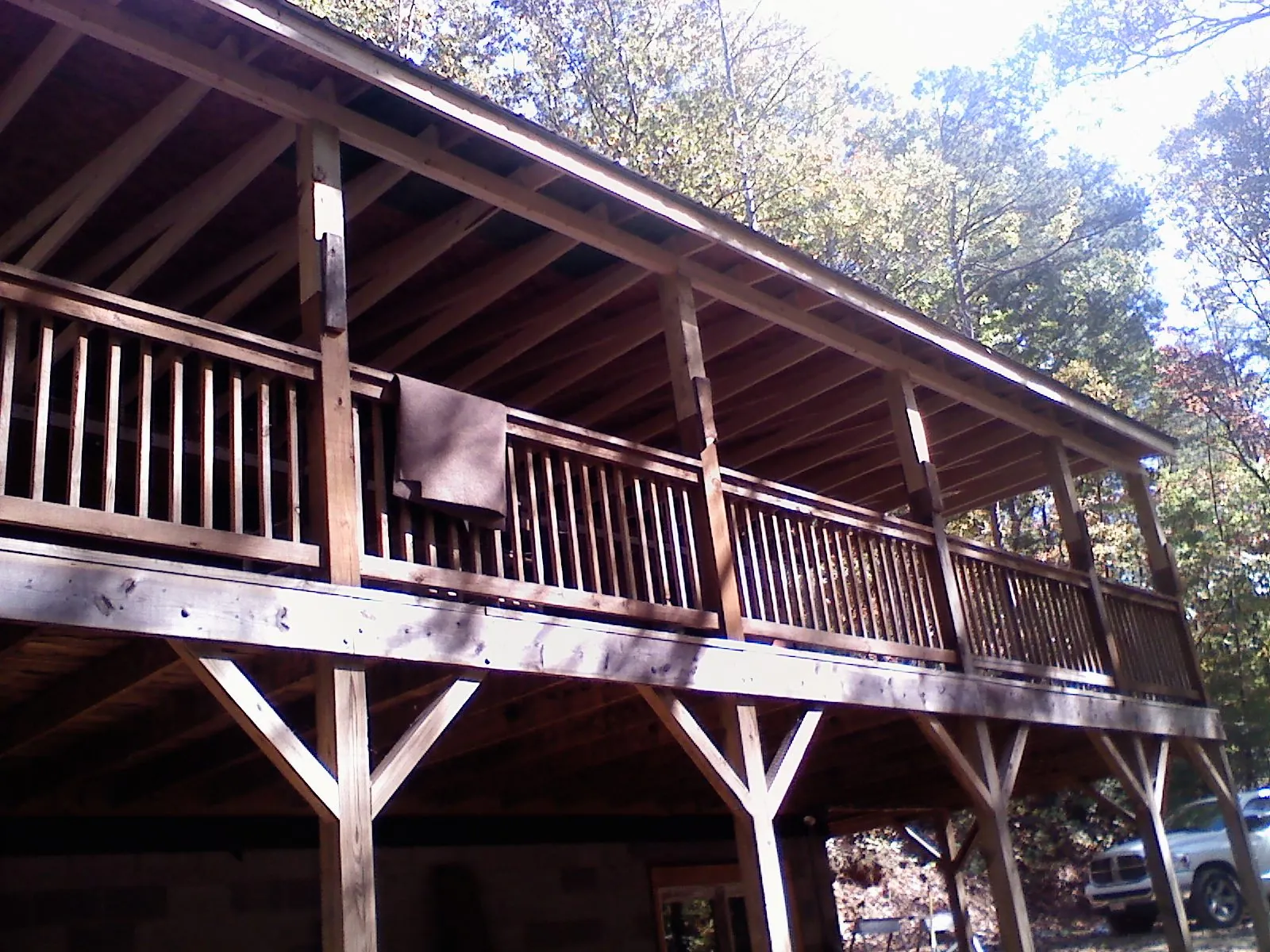 Timber framing under a new elevated porch and deck — Roof Leak Repair in Pine Hill by Roofing Brothers